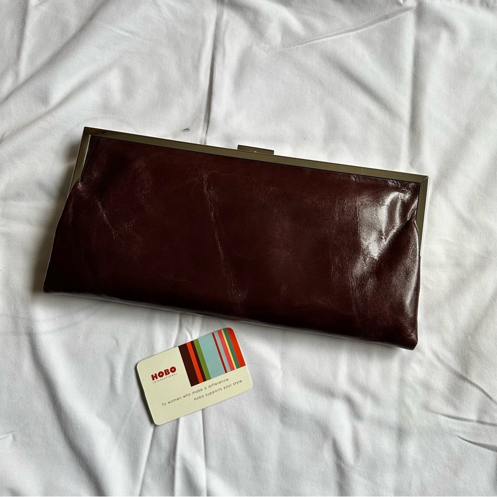 Hobo International brown leather clutch